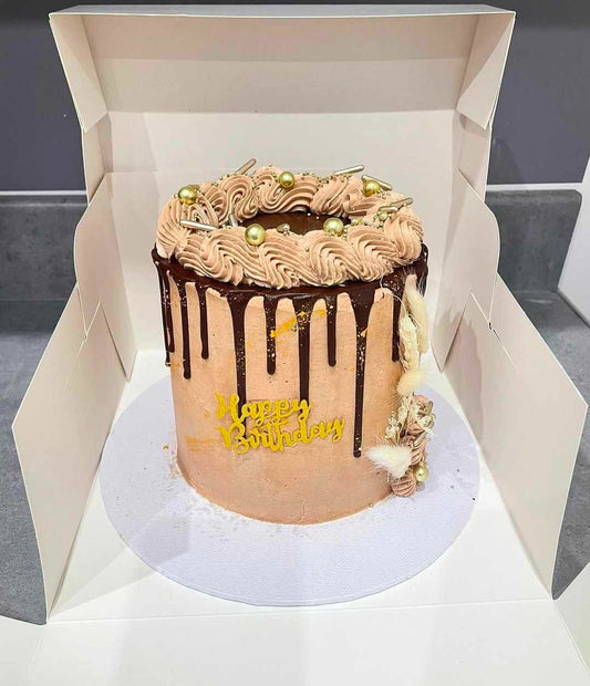 Golden Blush Drip Cake
